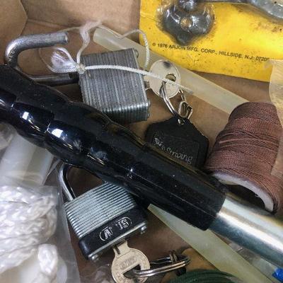 Lot # 117 Garage Items- rat trap, sand paper, locks