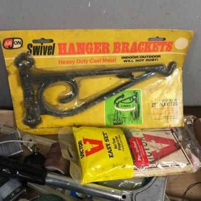 Lot # 117 Garage Items- rat trap, sand paper, locks