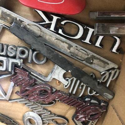 Lot # 125 Box of Car Emblems 