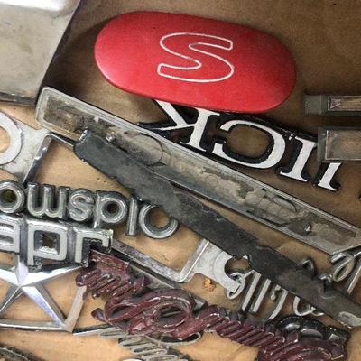 Lot # 125 Box of Car Emblems 