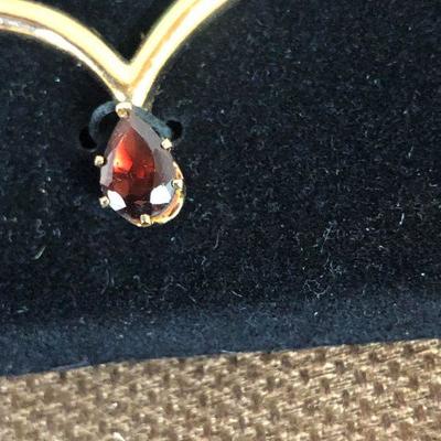 Lot # 160 Garnet on a gold tone chain 'ladies Costume Jewelry