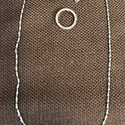 Lot # 165 Chain and Heart Shaped Earrings and round pendant