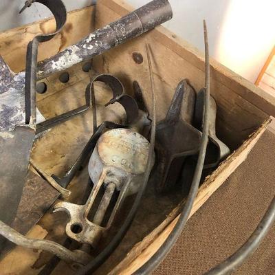 Lot # 183  Crate full of Rusty stuff: Shears, shovel, Pitch fork 