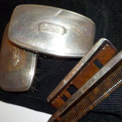 Vintage 4 piece Sterling silver Brushes and comb set.