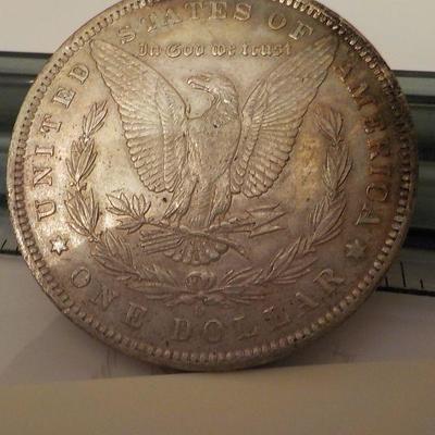 1885 Morgan silver dollar.