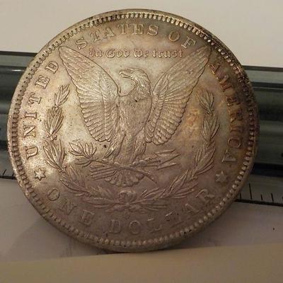 1885 Morgan silver dollar.