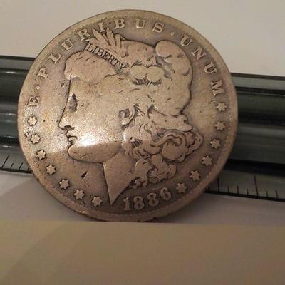 1886 Morgan silver dollar.