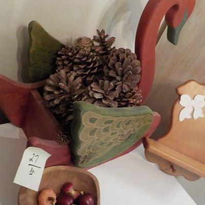 Lg wood swan and rabbit @ bowl fruit.