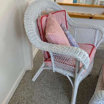 White painted wicker arm chair with ottoman