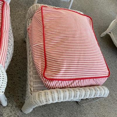 White painted wicker arm chair with ottoman