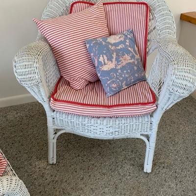 White painted wicker arm chair with ottoman