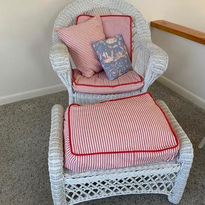 White painted wicker arm chair with ottoman