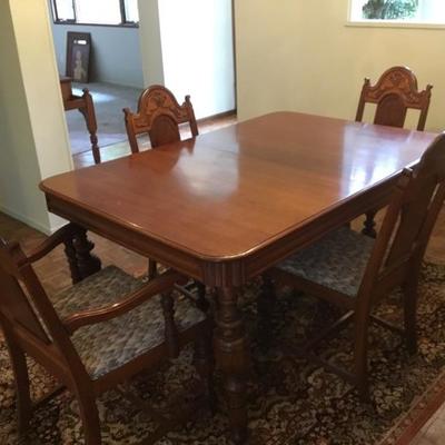 D-101 Antique Spanish revival dining table and six chairs