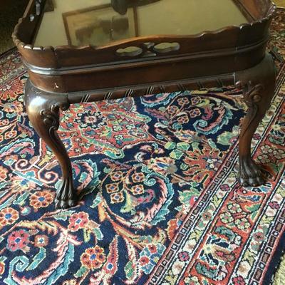 L-118 antique pie crust style coffee table, clawfoot and heavily carved