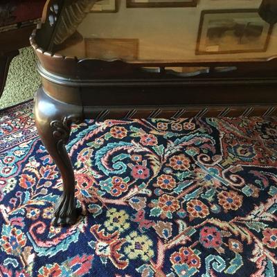 L-118 antique pie crust style coffee table, clawfoot and heavily carved