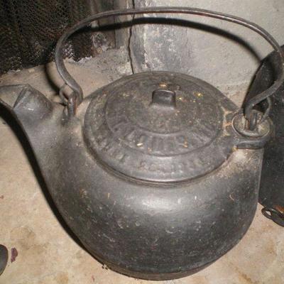 Three Pieces Vintage Cast Iron Covered Pot, Kettle, Pot and Ladle