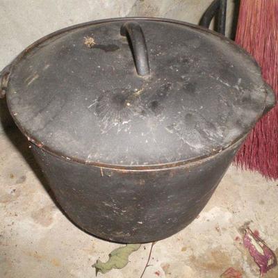 Three Pieces Vintage Cast Iron Covered Pot, Kettle, Pot and Ladle