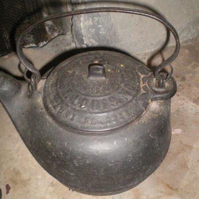 Three Pieces Vintage Cast Iron Covered Pot, Kettle, Pot and Ladle
