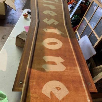 Large metal Firestone bowtie sign