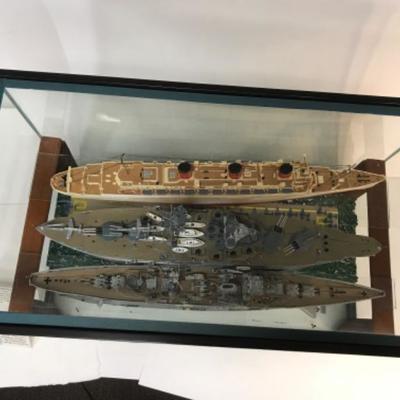 5 Completed ship models inside homemade display case