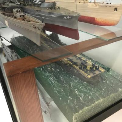 5 Completed ship models inside homemade display case