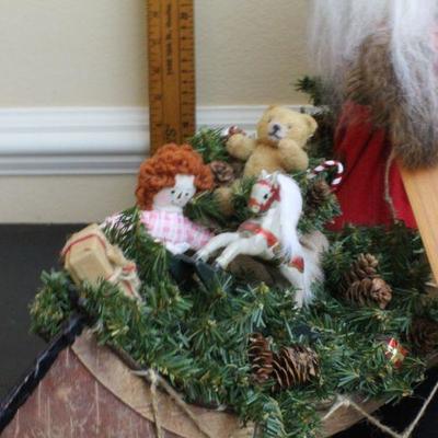 LOT #64: Tall Santa Claus Christmas Figure in Sled 