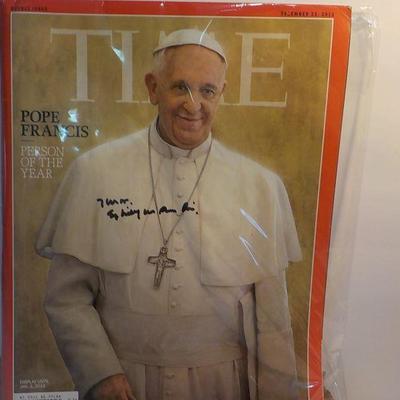 Time Magazine's "Pope Francis" and signed by the pope.