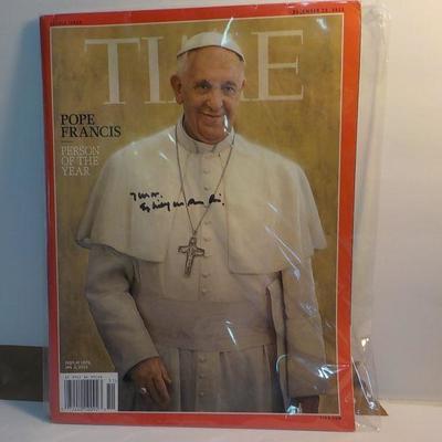 Time Magazine's "Pope Francis" and signed by the pope.