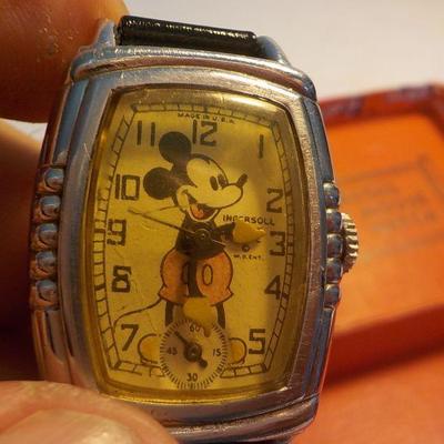 "Vintage 1938 Mickey Mouse wrist watch with box." made by Ingersoll.