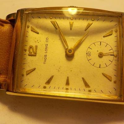 " Thomas Long Company" mens wrist watch.