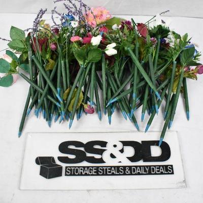 Container Full of Flower Pens