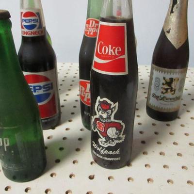 Lot 12 - Soda Bottles - Coke Pepsi Sun Drop 7up