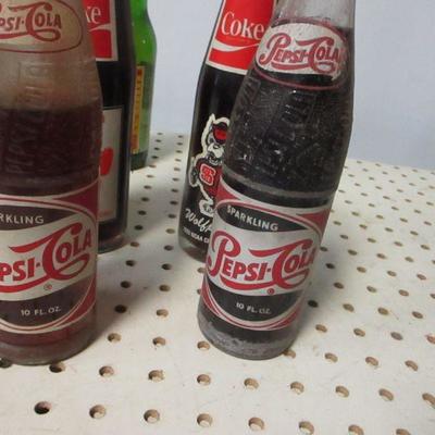 Lot 12 - Soda Bottles - Coke Pepsi Sun Drop 7up