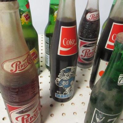 Lot 12 - Soda Bottles - Coke Pepsi Sun Drop 7up