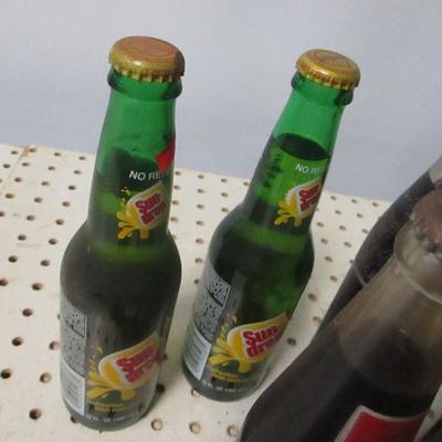 Lot 12 - Soda Bottles - Coke Pepsi Sun Drop 7up