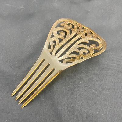 .50. Celluloid & Brooch Lot