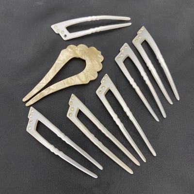 .50. Celluloid & Brooch Lot