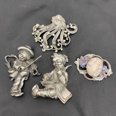 .51. Hummel & Other Pewter Brooches