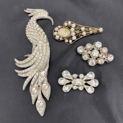 .54. Rhinestone Brooches