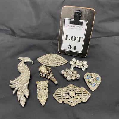 .54. Rhinestone Brooches