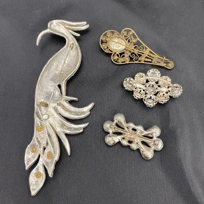 .54. Rhinestone Brooches