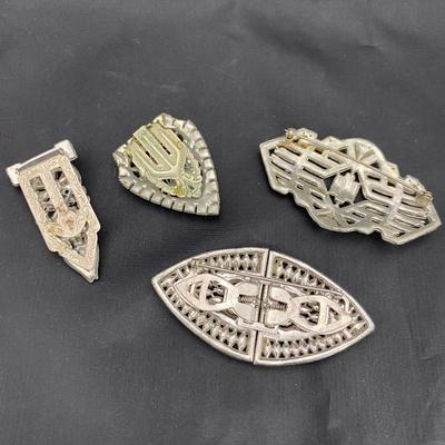 .54. Rhinestone Brooches