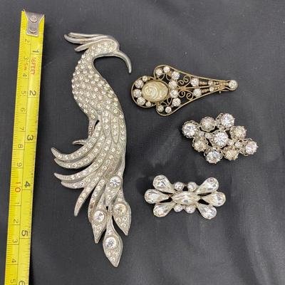 .54. Rhinestone Brooches