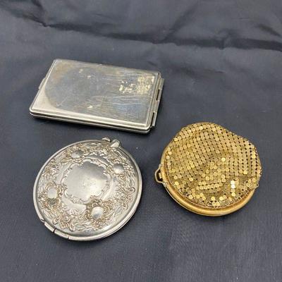 .57. Three Vintage Compacts