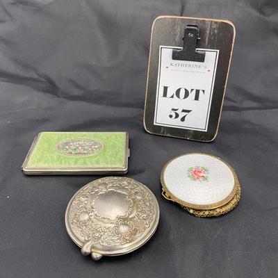 .57. Three Vintage Compacts