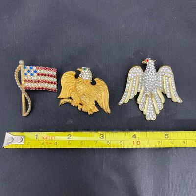 .60. Patriotic Brooches