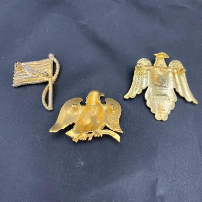 .60. Patriotic Brooches