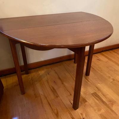 143: Bartley Collection Cherry Oval Drop Leaf Table 