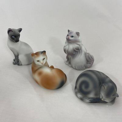 .71. Set of 4 Porcelain Cats