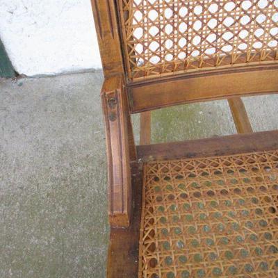 Lot 63 - Nice Antique Walnut and Cane Back and Seat Wooden Rocking Chair